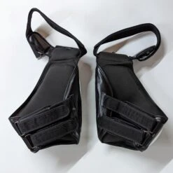 Fairtex Compact Thigh Trainer Kick Pads TP4 5 Fairtex Compact Thigh Trainer Kick Pads TP4 -The Clinch Fight Shop FairtexTP4ThighPadProtectorBlackWhite